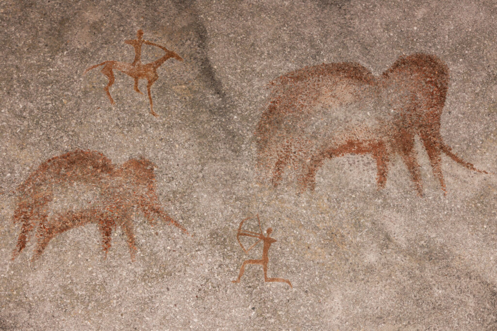 Rock,Paintings,Of,Ancient,People.,On,The,Rock,Wall,Of